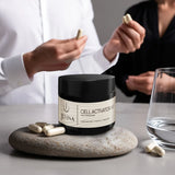 Juvina Cell Activator XR NMN supplement jar with time-released capsules displayed during a daily wellness routine.